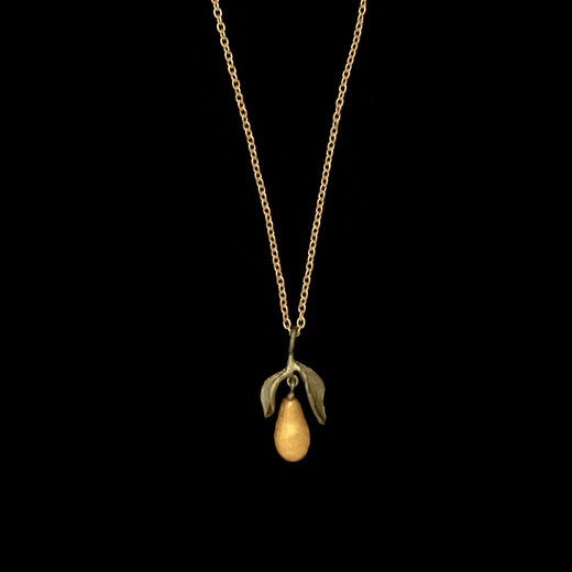 A miniature golden pear is the pendant of this understated fine gold necklace